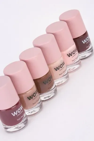 Group of WOW London nail polish bottles, various shades, including possible #83