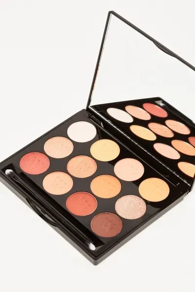 Open WOW Be Mine eyeshadow palette with mirror, warm-toned shades