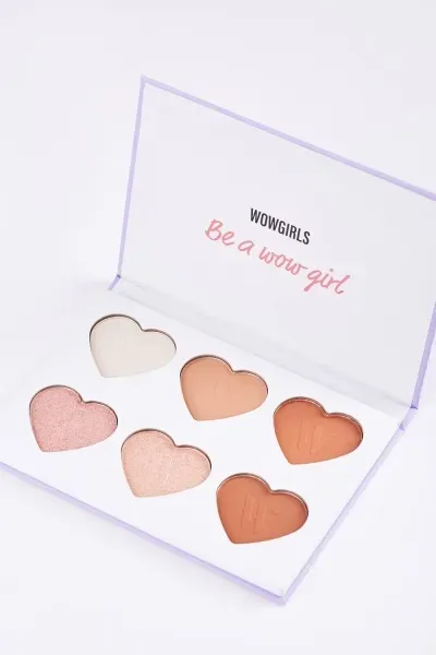 Open WOW Girls heart-shaped eyeshadow palette showing six shades